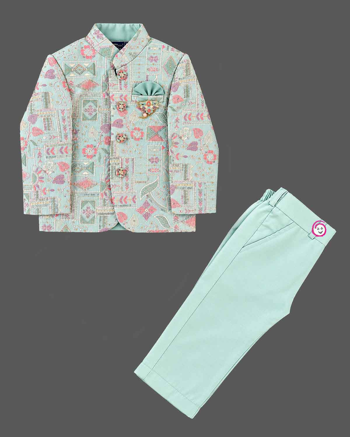 Detailed kids sherwani featuring geometric jacquard weave with mandarin collar and pocket square accent.