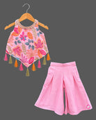 Sleeveless kurti for kids with asymmetric tassel hem and wide-leg pleated palazzo pants.