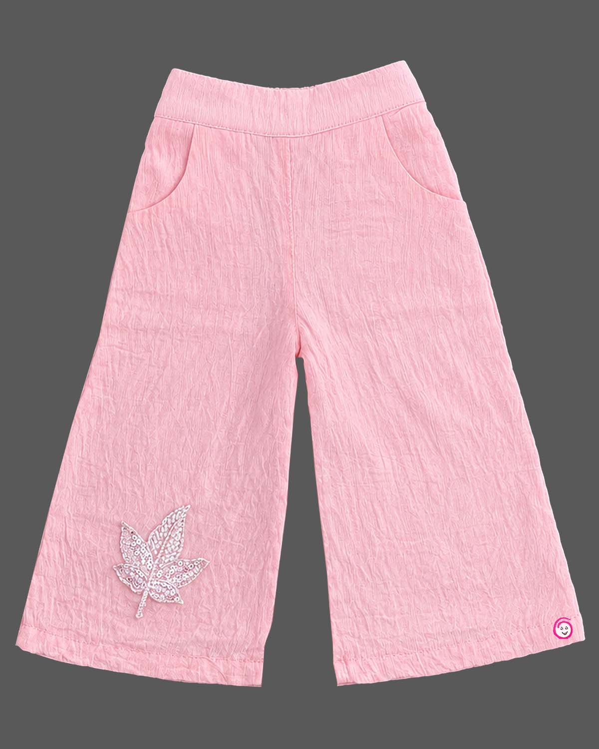 Sleeveless button-down top with floral applique and trousers set as a baby party wear dress.