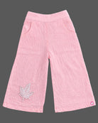 Sleeveless button-down top with floral applique and trousers set as a baby party wear dress.