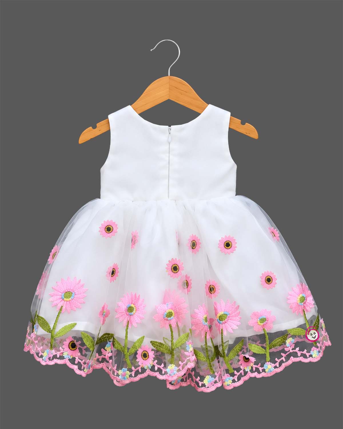 Toddler sleeveless floral embroidered tulle frock featuring a large front waist bow and flared mesh skirt overlay.