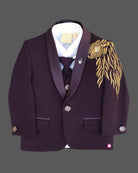Boys wine designer tuxedo suit set featuring a shawl collar blazer with intricate gold shoulder embroidery, shirt, waistcoat, tie, and matching formal pant