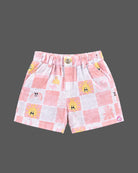 Co-ord set for baby boy featuring a button-down checkered shirt and matching shorts with sun graphics