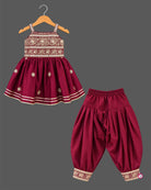 Infant silk patiyala set with embroidered sleeveless top and dhoti pants for festive wear