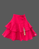 Girls floral embroidered sleeveless choli and tiered ruffle lehenga skirt set with drawstring tassel accents.