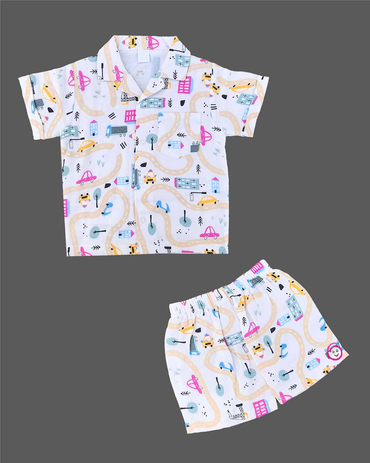 Boys 2-piece cotton casual co-ord set featuring a short-sleeve collared printed shirt and matching shorts in white with colorful cars, roads, and buildings print