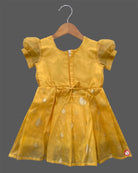 Toddler yellow cotton silk frock with border for festive wear