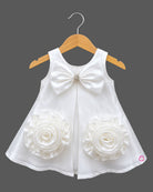 Kids party wear satin A-line frock with large rosette flower accents, matching headband, and soft booties set.