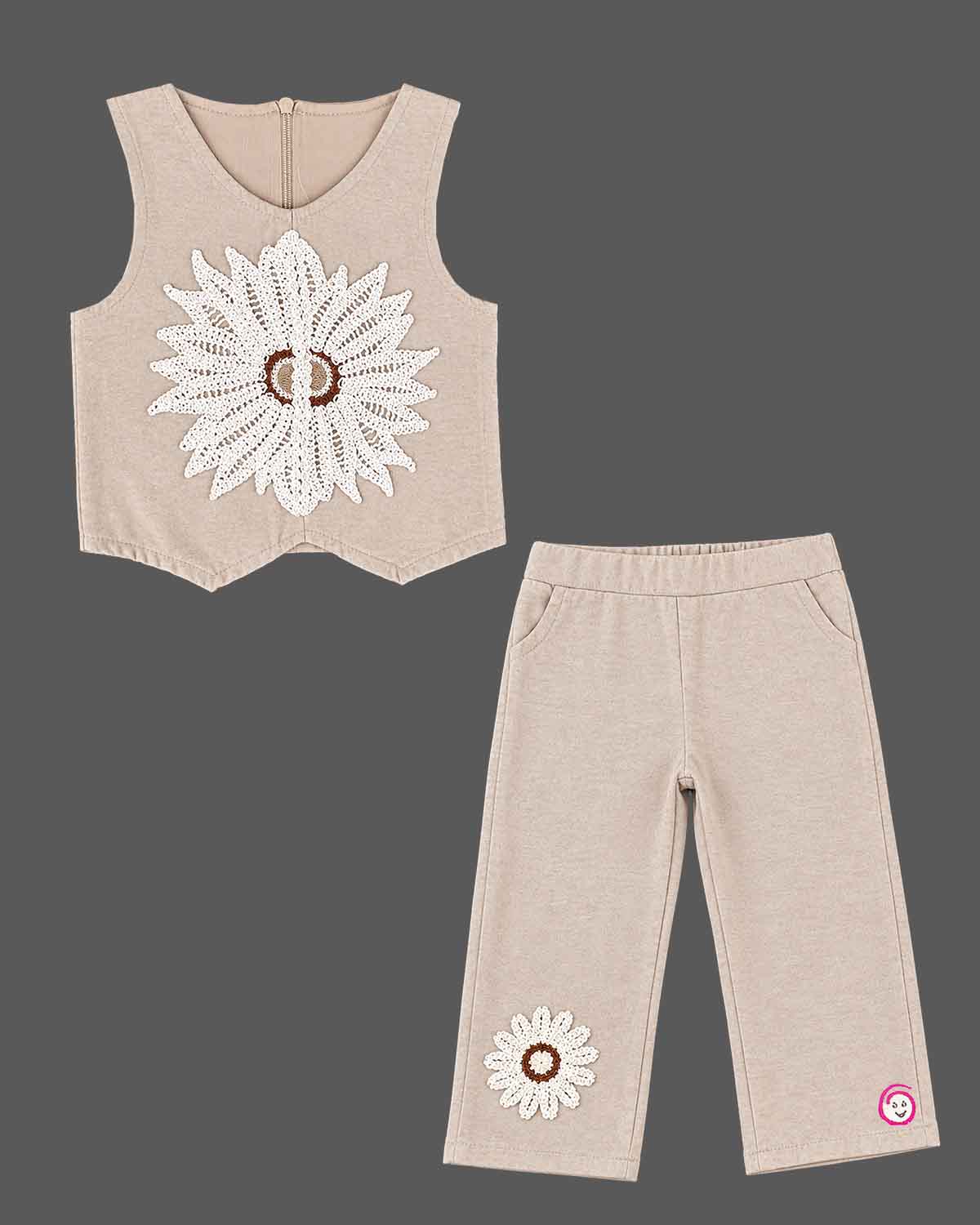 Kids party wear vest top and trouser set featuring crochet floral applique and back zipper closure.