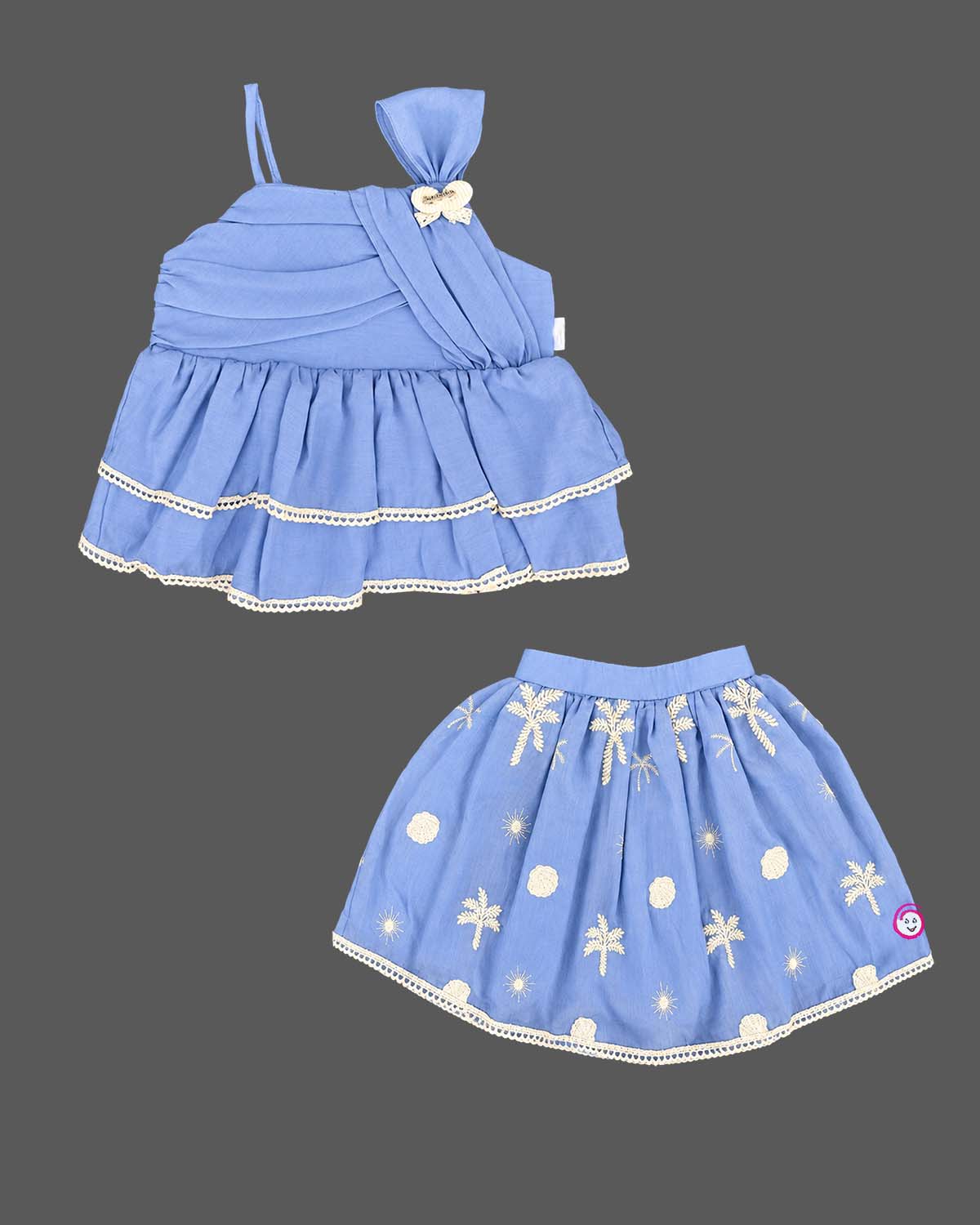 Baby party wear dress featuring a layered pleated top and embroidered flared skirt set with lace trim.