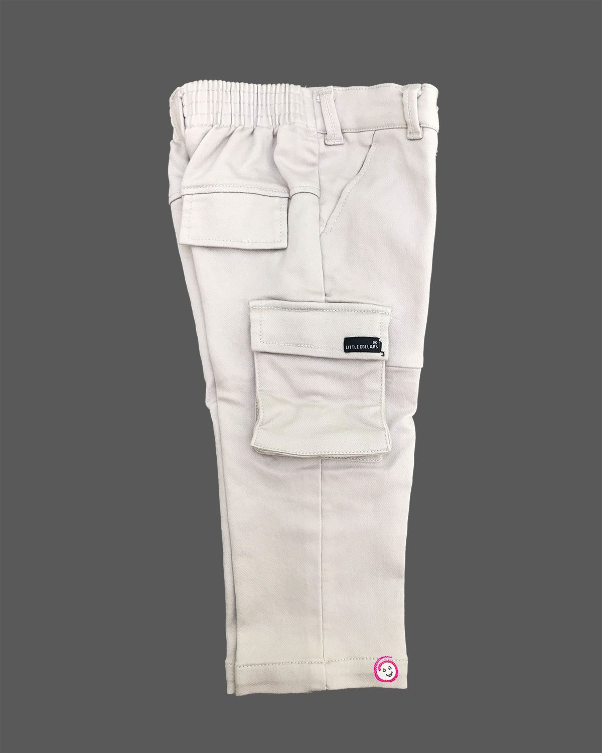 Modern two-piece casual set for toddler boys featuring a zip-front high-neck shirt jacket with graphic patches alongside matching cargo pants.
