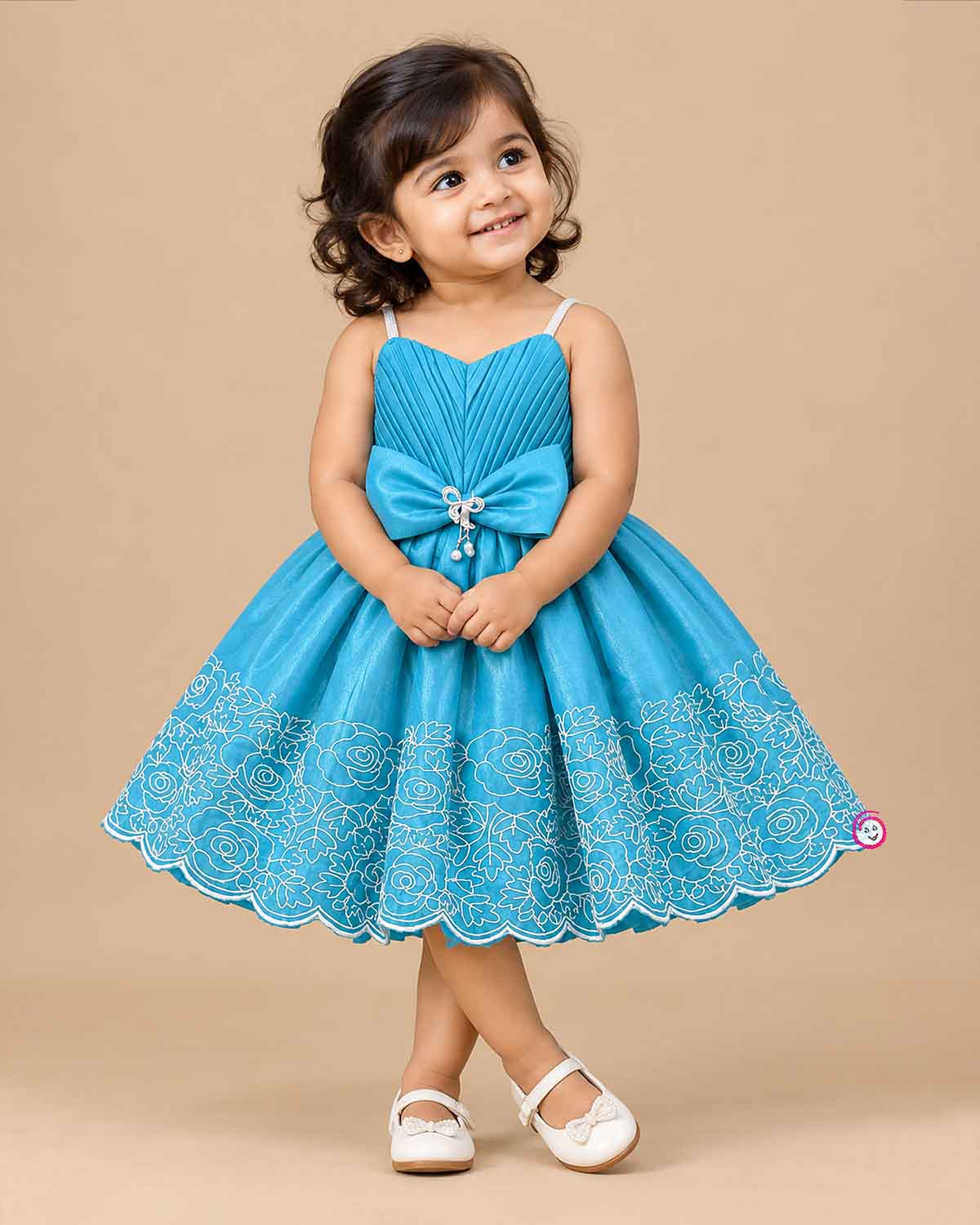 Sky blue embroidered net party frock for girls with bow detail and scalloped hem
