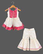 Sleeveless printed short kurta and flared tiered kids sharara set with gota trim details.