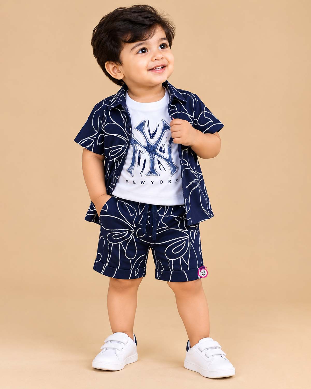 Boys party wear printed short sleeve shirt and elasticated shorts set with line art graphics