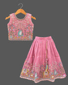Designer baby girl lehenga set featuring hand-embroidered sequin motifs, sleeveless choli, and pleated flared skirt