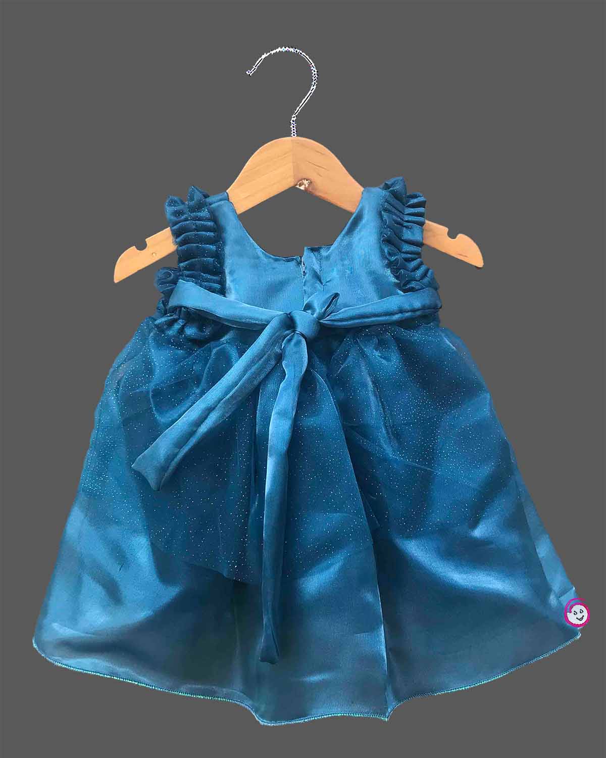 Teal blue shimmer net party frock for toddler girls with ruffled shoulders and center rose flower detail