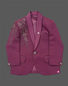 Boys tailored three-piece suit set featuring structured blazer, button-down shirt, and dress pant for events.
