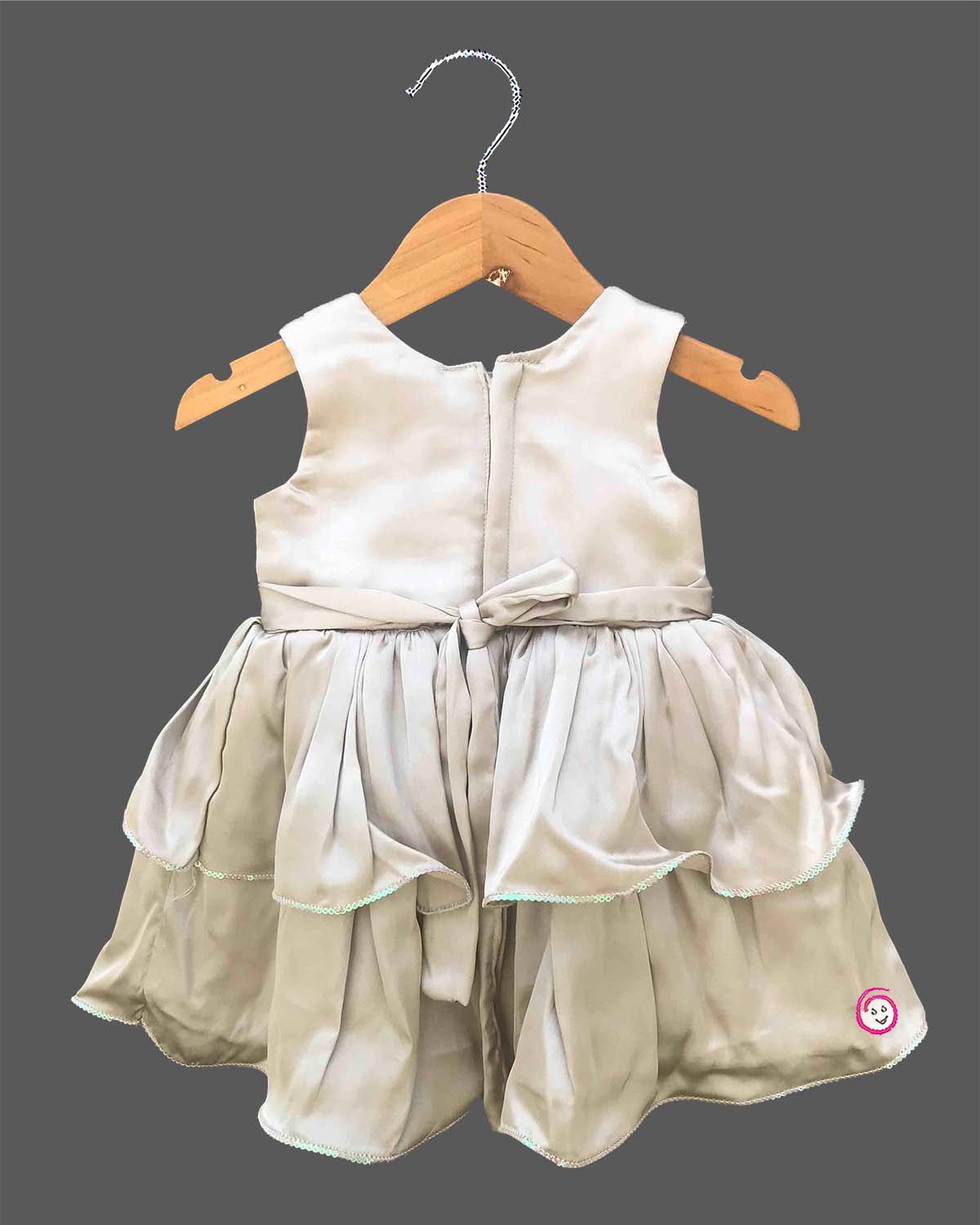 Beige gold sequined satin frock for baby girls with bow accent for birthday party