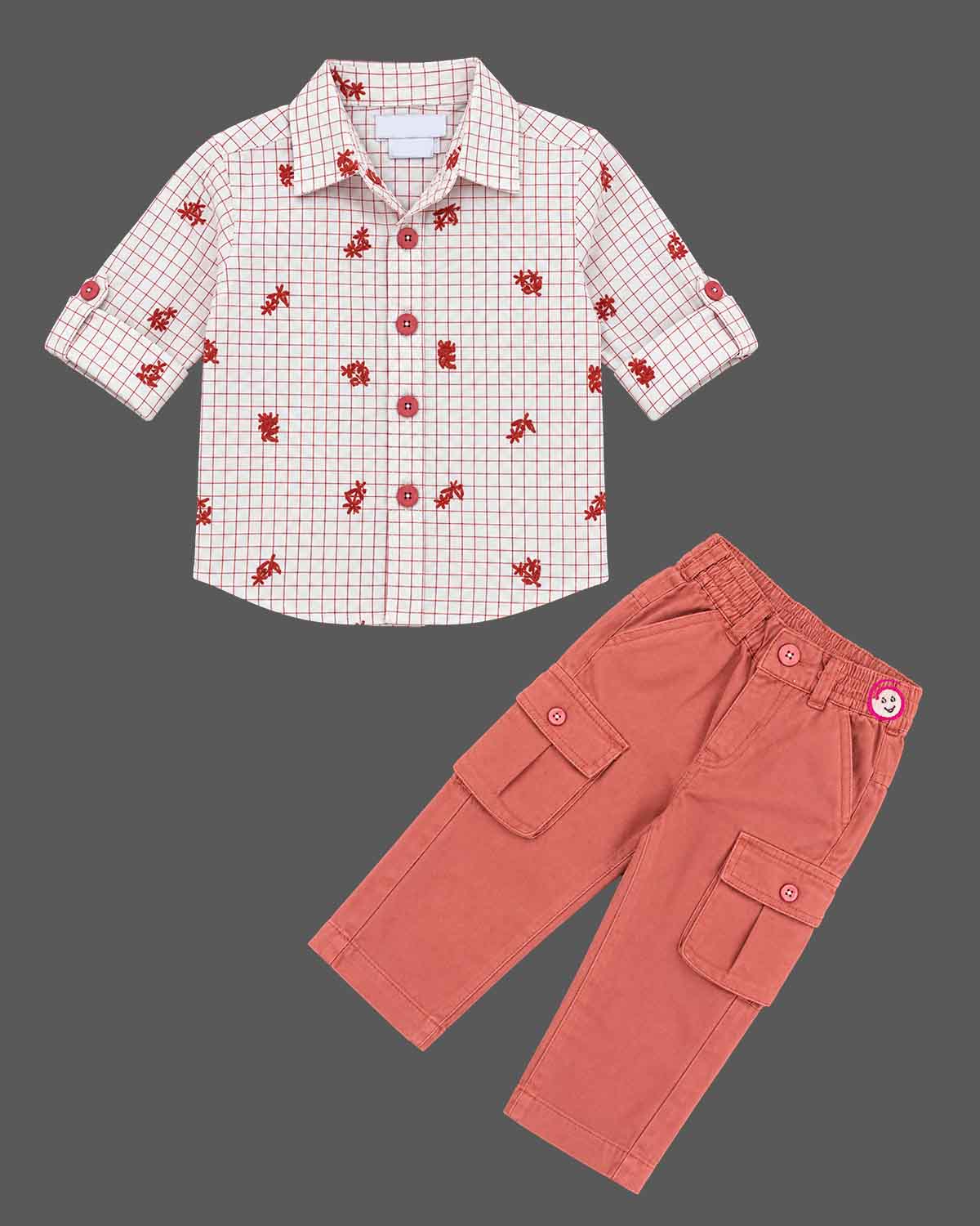Toddler checked shirt with roll-up sleeves paired with utility cargo trousers for party wear for boys.