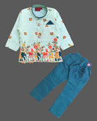 Boys light blue ethnic silk sherwani with vibrant elephant and deer motifs, mandarin collar, pocket square, paired with blue elastic waist pant