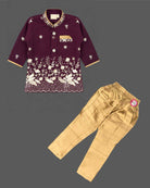 Little boy wearing purple and gold embroidered silk sherwani suit for weddings and festive functions