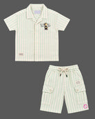 Toddler wearing  collar button-down shirt and shorts as baby boy western wear.