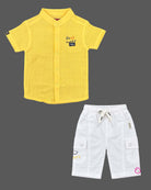Toddler wearing short-sleeve button-down shirt and shorts designed for kids western wear.