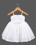 Flared netting baby party wear dress with oversized bodice rosette, matching bow headband, and soft booties.