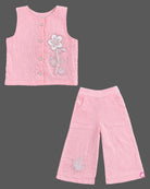 Sleeveless button-down top with floral applique and trousers set as a baby party wear dress.