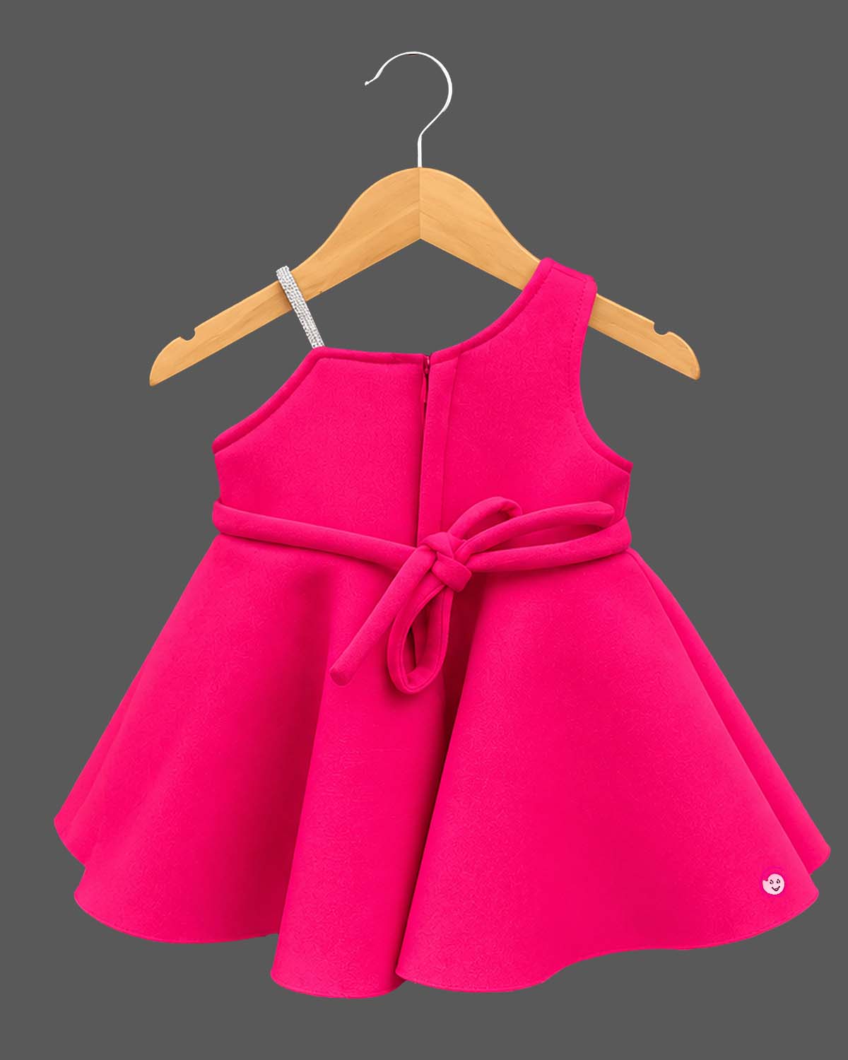 Structured one-shoulder kids party wear frock set with large 3D flower applique, soft booties, and bow headband