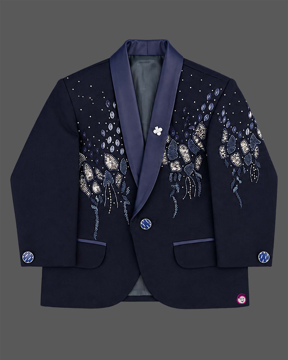 Boys formal tuxedo suit set featuring bead embellished blazer with bowtie and pant.
