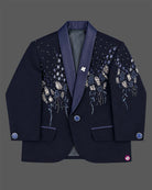 Boys formal tuxedo suit set featuring bead embellished blazer with bowtie and pant.
