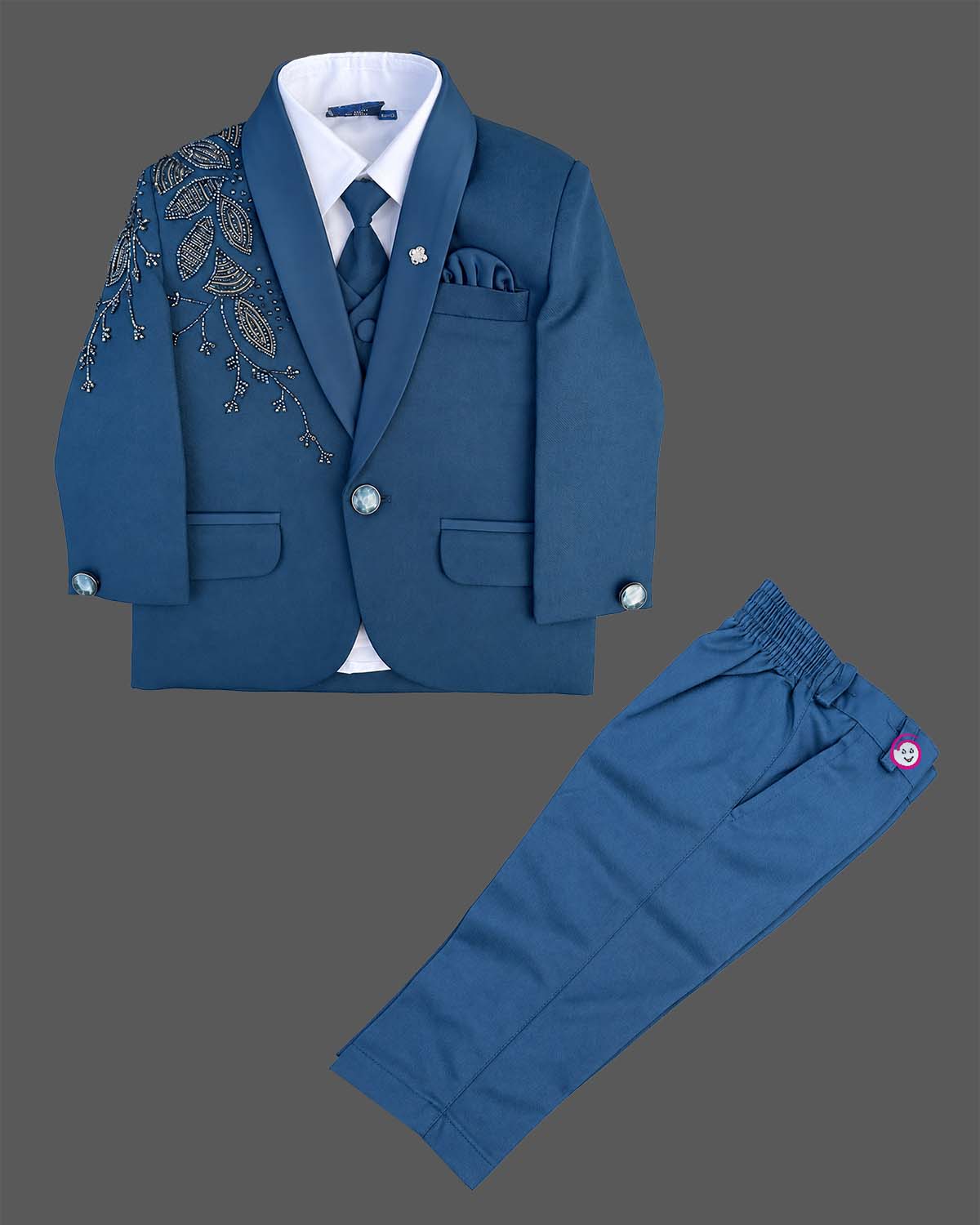 Boys embellished tuxedo suit set with botanical lapel embroidery, matching tie, and pant.