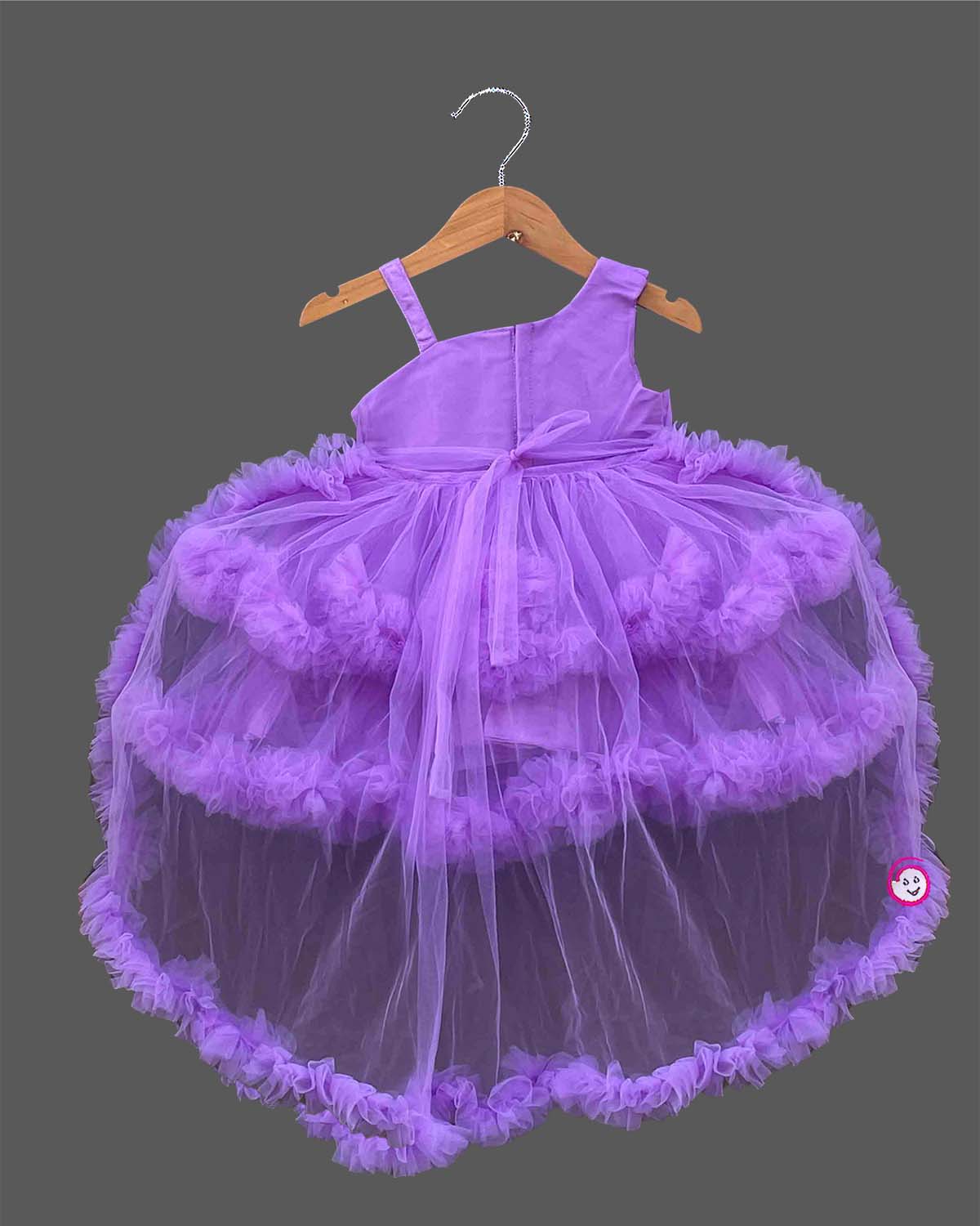 Purple net frock with layered ruffles and floral embellishment for girls
