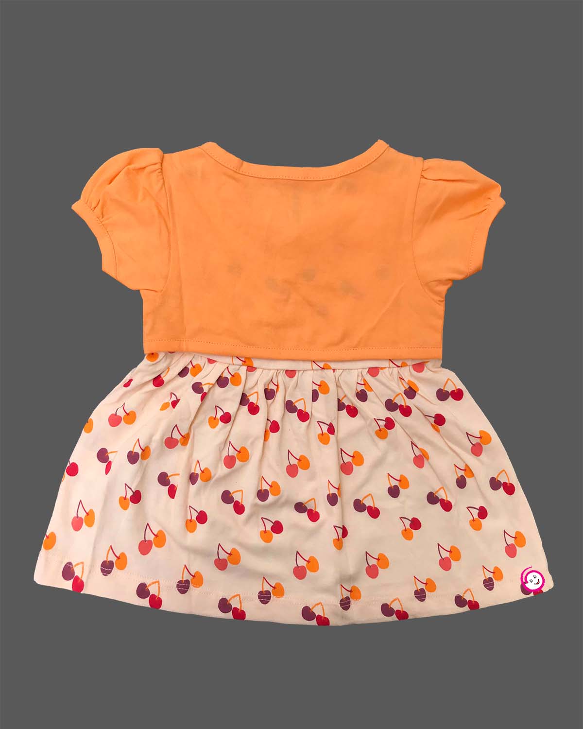 Infant cotton frock with short puff sleeves and printed pattern for casual outing