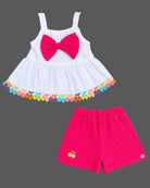 Baby party wear dress set featuring a sleeveless strap top with front bow trim and matching shorts.