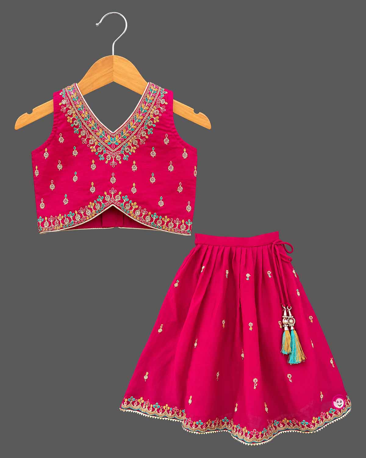 Embroidered V-neck lehenga choli for kids set featuring intricate threadwork, pleated skirt, and sheer dupatta