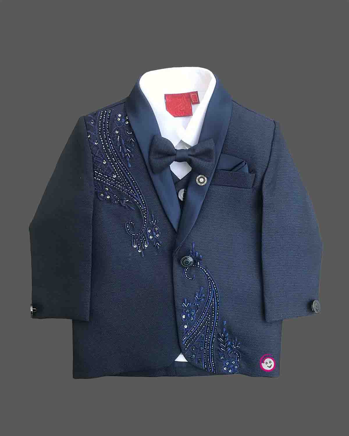 Boys navy blue formal tuxedo blazer with sequin embellishments, satin , bow tie, brooch pin, paired with elastic waist formal pant