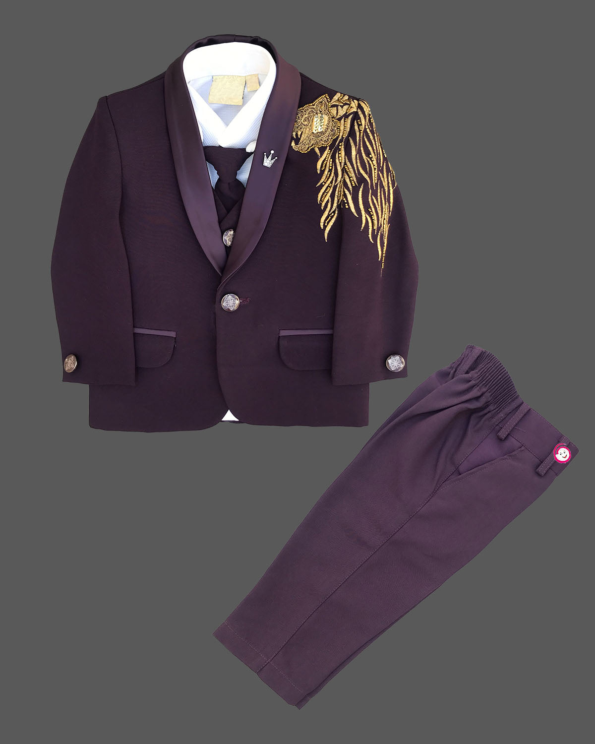 Boys wine designer tuxedo suit set featuring a shawl collar blazer with intricate gold shoulder embroidery, shirt, waistcoat, tie, and matching formal pant