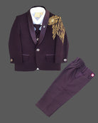 Boys wine designer tuxedo suit set featuring a shawl collar blazer with intricate gold shoulder embroidery, shirt, waistcoat, tie, and matching formal pant