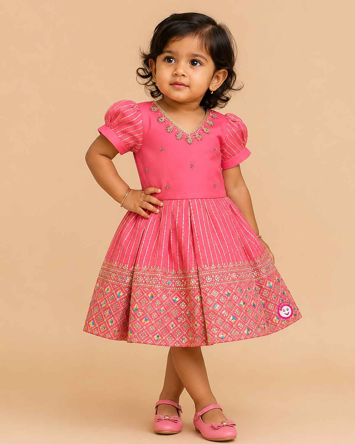 Infant cotton silk frock in peach pink with gold zari work and neckline embroidery for ear piercing ceremonies, festivals, temple visits, and weddings  