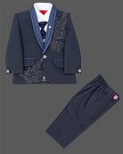 Navy blue formal tuxedo suit set for boys with crystal embellishments, shawl collar jacket, white shirt, tie, and pant for wedding party