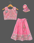 Floral embroidered lehenga choli for kids featuring flared skirt and net dupatta