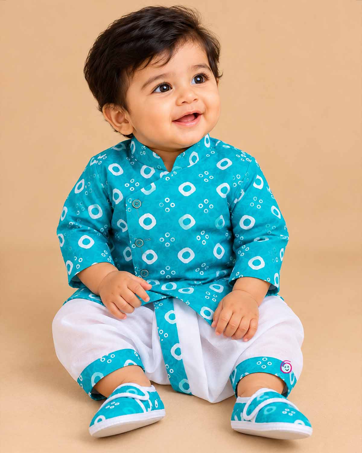 Baby boys bandhani printed angrakha kurta with elasticated dhoti pants and matching velcro booties set.