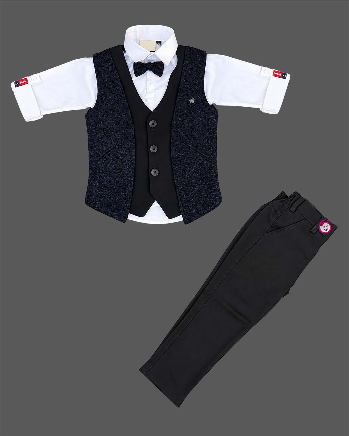 Boys textured jacquard waistcoat suit set with shirt, bow tie, and pant for formal events.