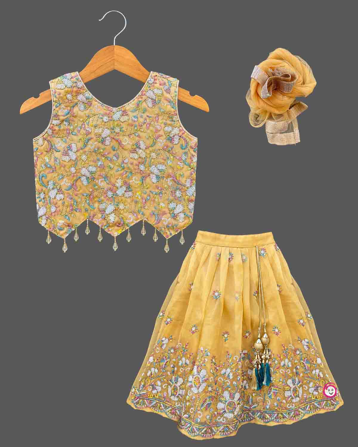 Kids sequined embroidered choli lehenga set with scalloped hem and hair accessory