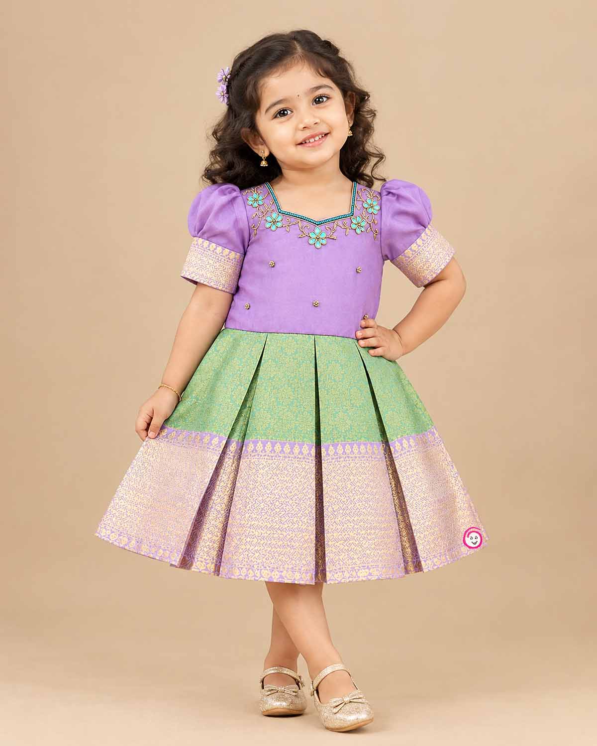 Pattu frock for girls with floral embroidered yoke, puff sleeves and zari border box-pleated skirt