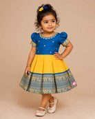 Infant silk cotton frock in blue and yellow for naming ceremonies, festivals, temple visits, birthdays, and weddings