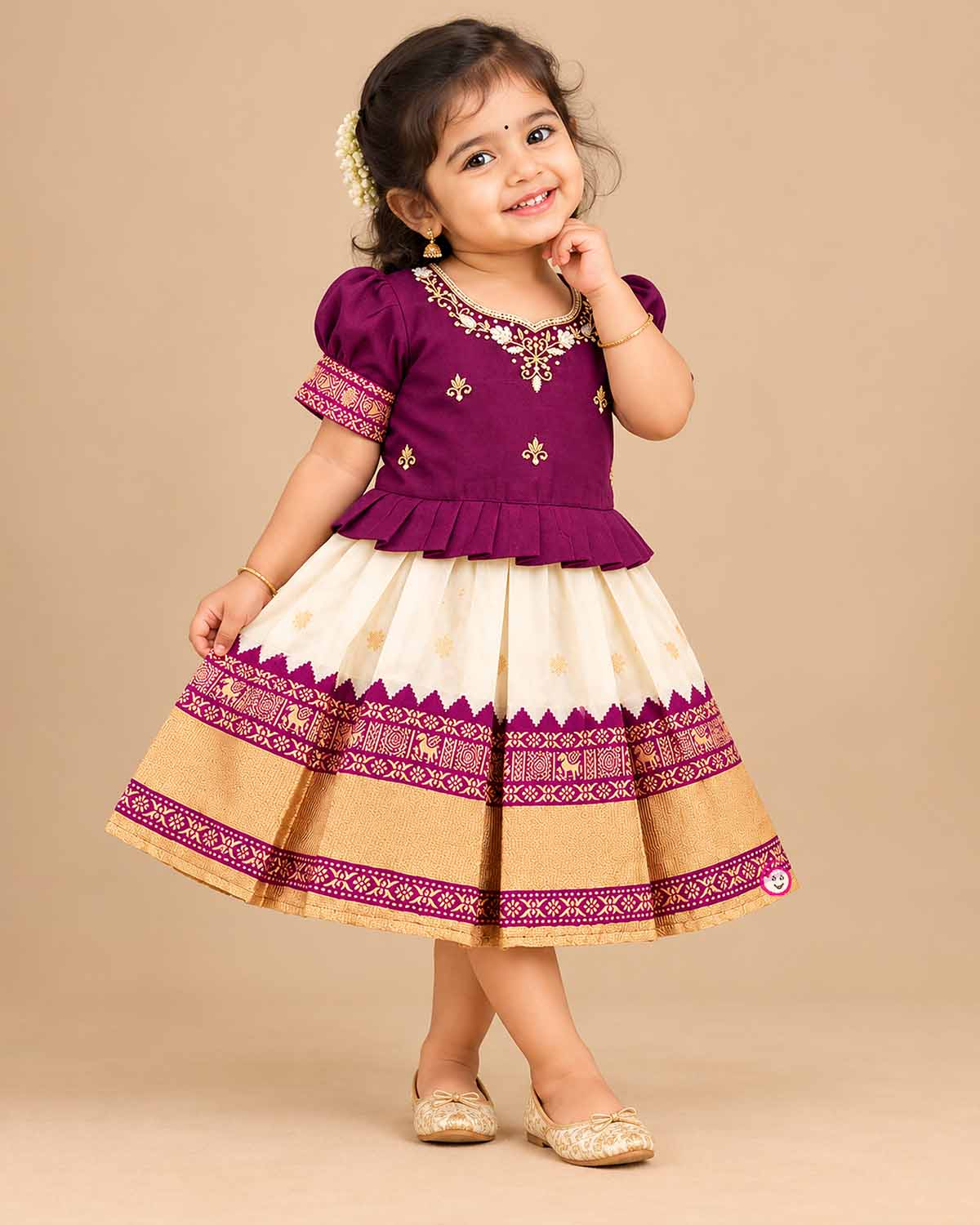 Toddle silk cotton frock  for kids featuring embroidered  puffed sleeves, and woven pleated skirt.