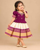 Toddle silk cotton frock  for kids featuring embroidered  puffed sleeves, and woven pleated skirt.